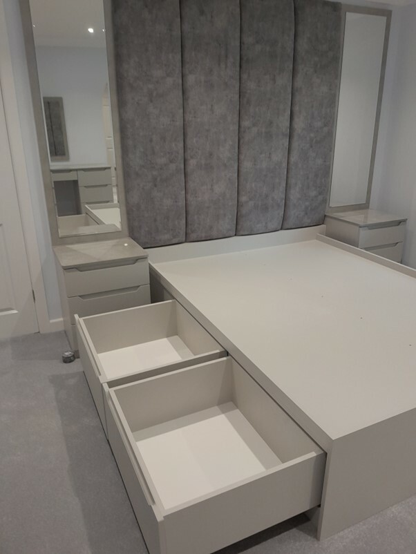 Bespoke bedroom furniture with underbed storage drawers.