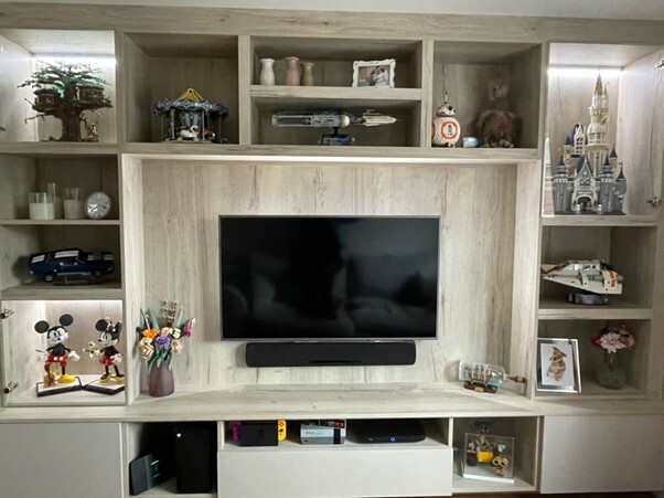 Fully decorated bespoke media unit with TV, DVDs and LEGO