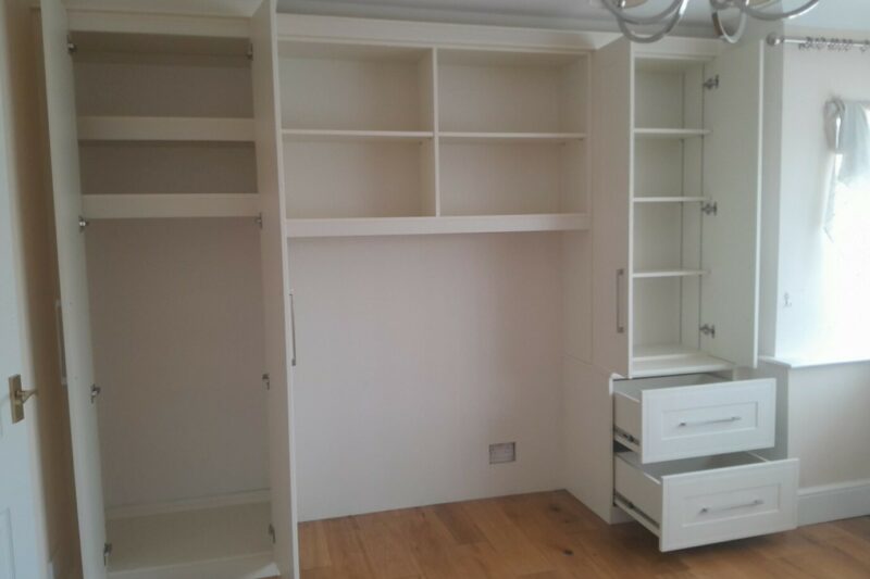 Bespoke shelving, drawers and furniture in a spare room